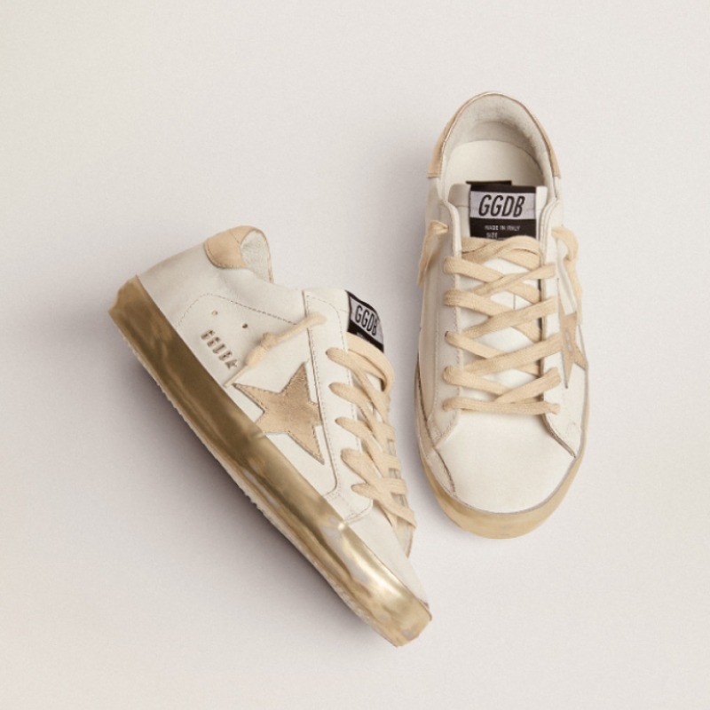 Women's Super-Star with gold sparkle foxing and metal stud lettering sneakers Size 9