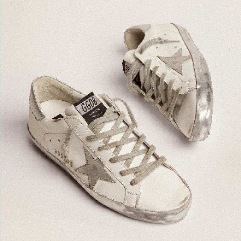 Women's Super-Star with silver sparkle foxing and metal stud lettering sneakers Size 10